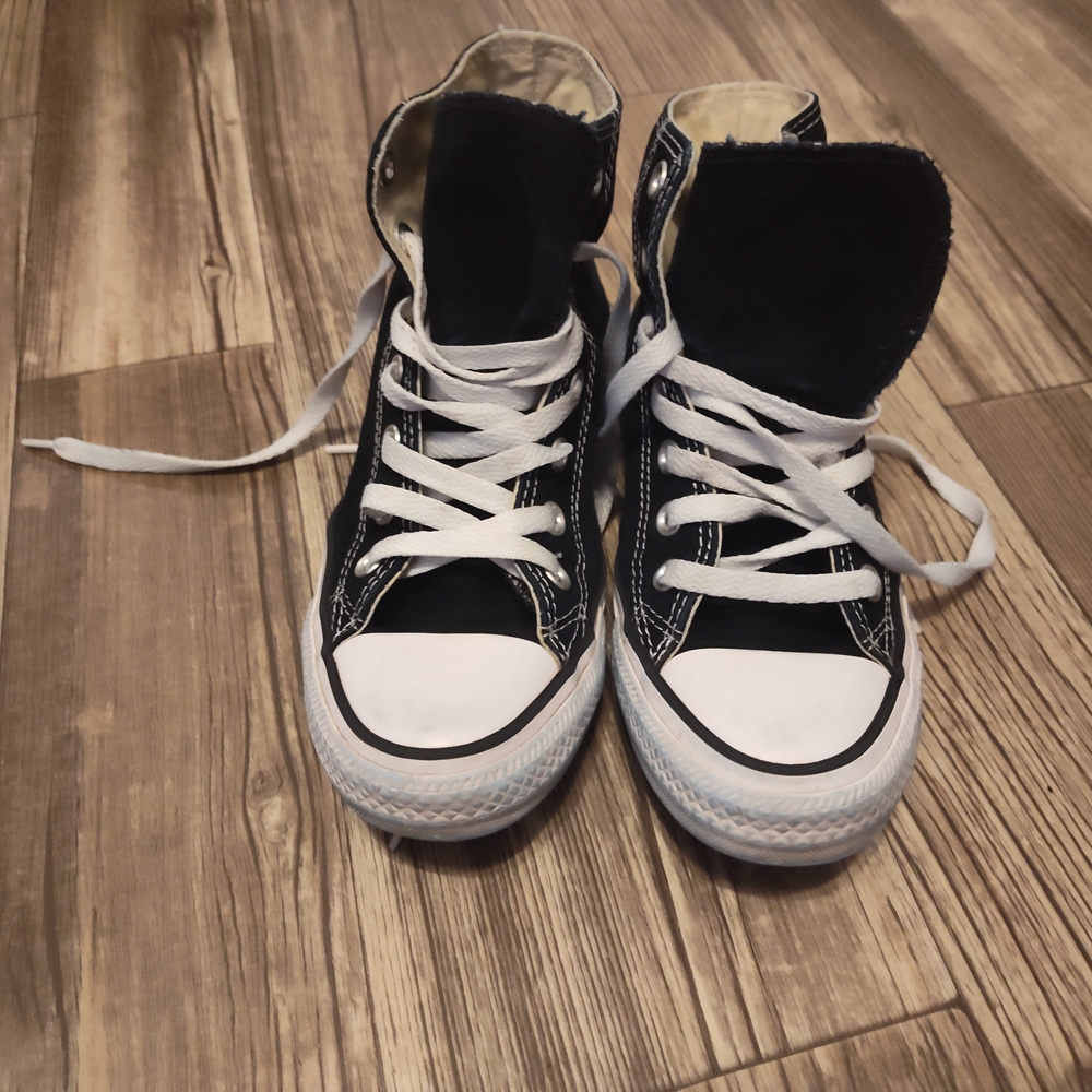 Sleek Black and White High-Top Sneakers with Cushioned Soles